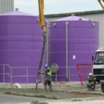 2 Purple chemical storage tanks