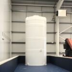 White vertical food grade tank