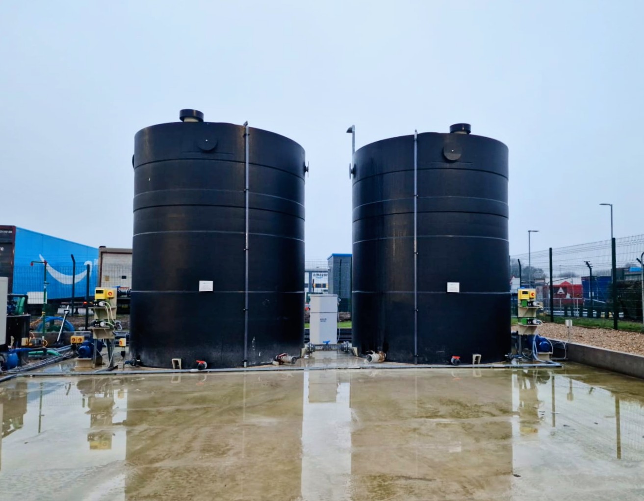 photo of two plastic water tanks Niplast made for ogden water